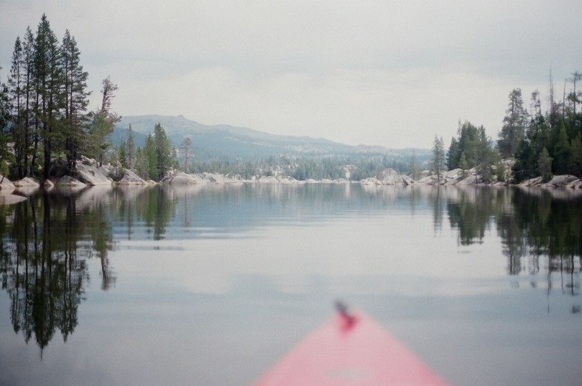 Cramped Up Utica Reservoir red kayak smooth waters