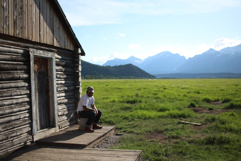 cramped up road trip grand tetons mountain log cabin
